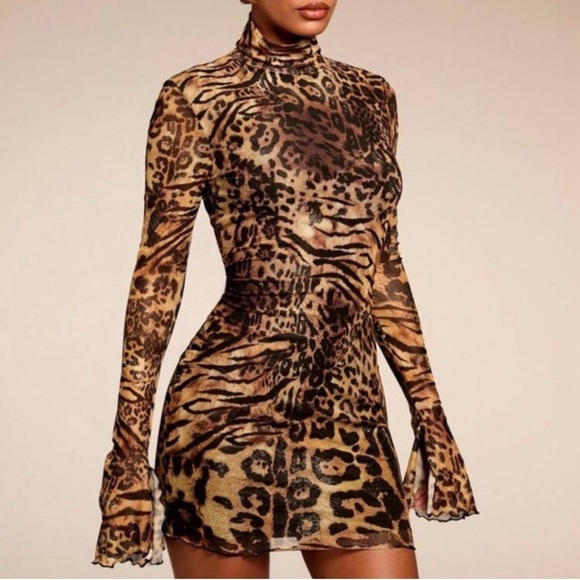 Dresses & Skirts - Animal Print Mesh Knitted
All Over Print Stand Collar long bell sleeves Sz Sm